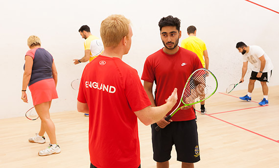 England coach tutoring at an England Squash course