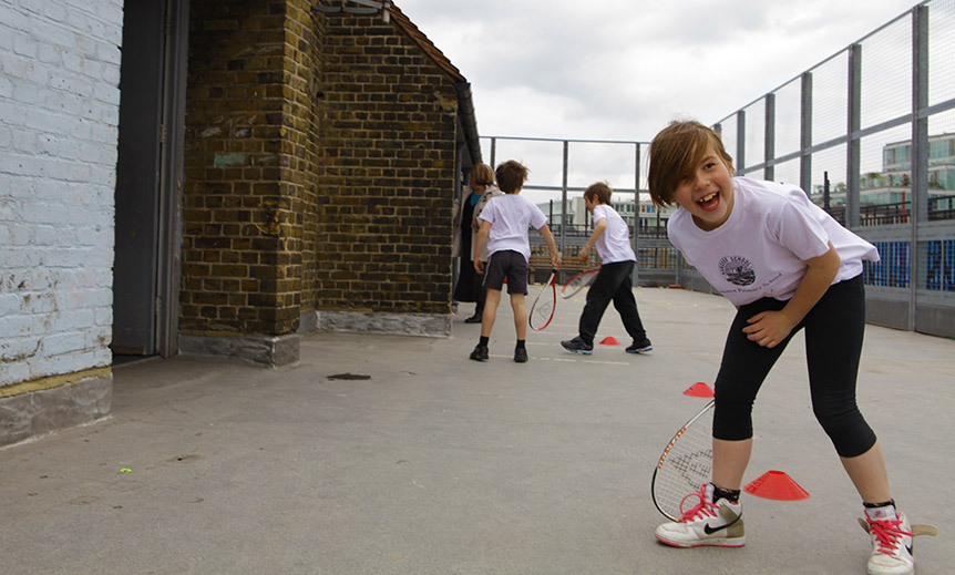 School kids playing squash