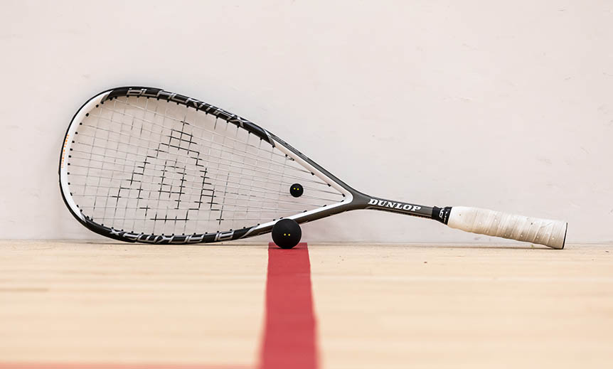 Squash racket on a court