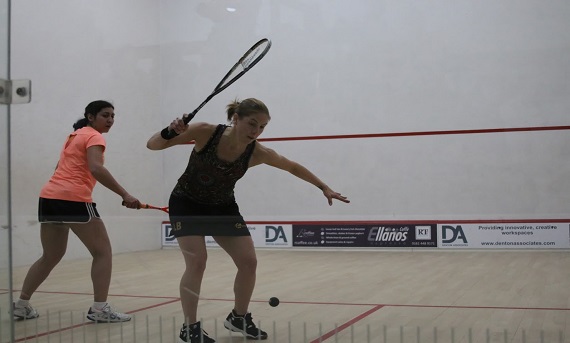 Female squash players on court